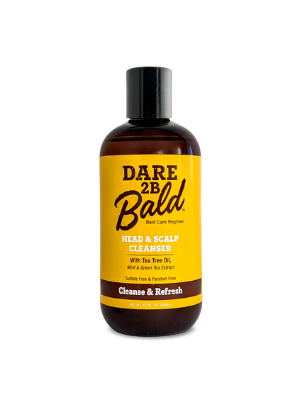 Dare 2B Bald head and scalp cleanser bottle with yellow label on a white background
